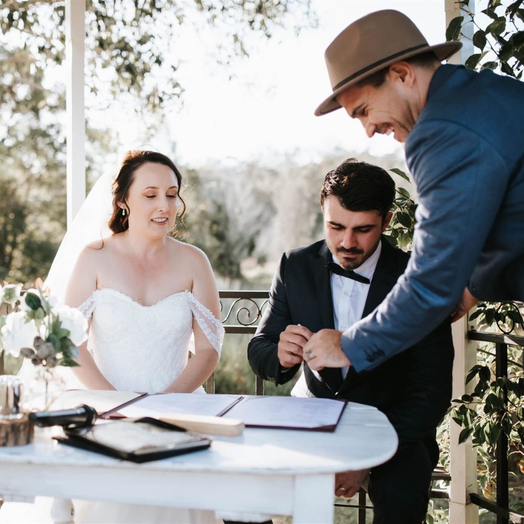 Ryan Martin facilitating the signing of the wedding registry